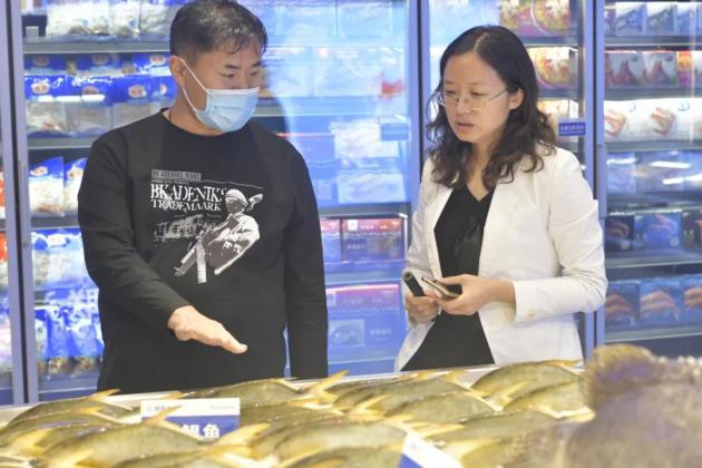 “行業黑馬”馳騁而來!歡迎鍋圈食匯蒞臨國聯水產考察調研